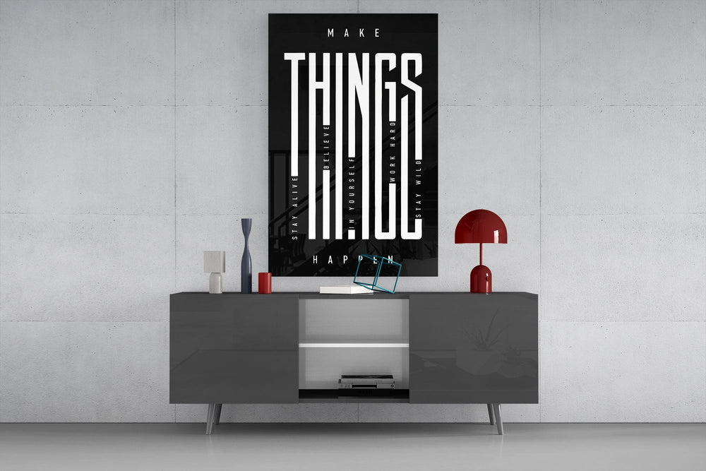 make things happen typography glass wall art displayed above a console in a designer interior