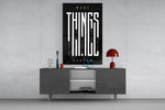 make things happen typography glass wall art displayed above a console in a designer interior