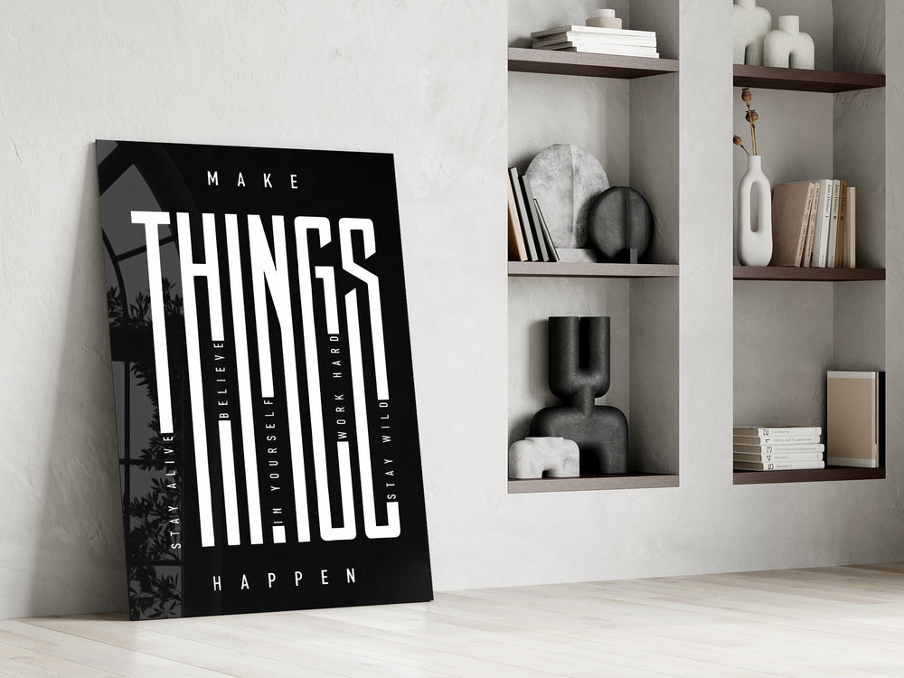 make things happen typography panel resting in a shelving niche in a modern interior