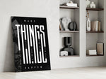 make things happen typography panel resting in a shelving niche in a modern interior