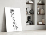 balance brain and heart typography panel resting in a shelving niche in a modern interior