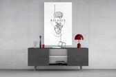 brain above heart balance line art glass wall art displayed above a console in a designer interior