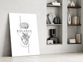 brain above heart balance line art panel resting in a shelving niche in a modern interior