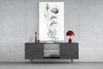 surreal balance collage of brain and heart glass wall art displayed above a console in a designer interior