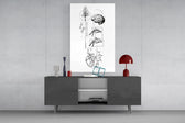 surreal balance collage of brain and heart glass wall art displayed above a console in a designer interior