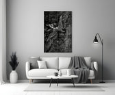 winged figure every fall to rise panel bringing character to a minimalist living room wall