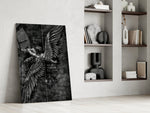winged figure every fall to rise panel resting in a shelving niche in a modern interior