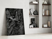 winged figure every fall to rise panel resting in a shelving niche in a modern interior
