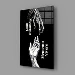 memento mori vivere reaching hands glass wall art angled to show the polished tempered glass panel