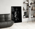 ascending phoenix sacred geometry glass wall art leaning beside a dark leather sofa