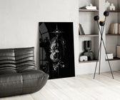 ascending phoenix sacred geometry glass wall art leaning beside a dark leather sofa