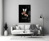 tattooed hands and the words the rebels never obey panel bringing character to a minimalist living room wall