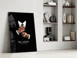tattooed hands and the words the rebels never obey panel resting in a shelving niche in a modern interior