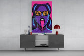 explicit pop art woman in sunglasses glass wall art displayed above a console in a designer interior