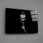 a grinning pale figure calling for silence glass wall art angled to show the polished tempered glass panel