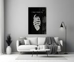 a skeleton hand gripping a roll of cash panel bringing character to a minimalist living room wall