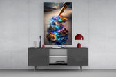 a fountain pen writing a glowing world glass wall art displayed above a console in a designer interior