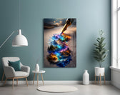 a fountain pen writing a glowing world glass wall art styled above an armchair in a reading corner