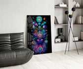 a cosmic deity crowned with planets glass wall art leaning beside a dark leather sofa