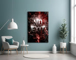 the words No Exit on cracked red stone glass wall art styled above an armchair in a reading corner