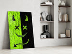 split neon green devil smiley panel resting in a shelving niche in a modern interior