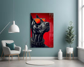 black guard dog on crimson red glass wall art styled above an armchair in a reading corner