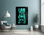 turquoise word stack hiding a face glass wall art styled above an armchair in a reading corner