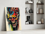 layered faces around a screaming skull panel resting in a shelving niche in a modern interior