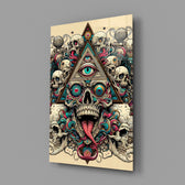 all seeing eye above a horned skull glass wall art angled to show the polished tempered glass panel