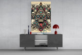 all seeing eye above a horned skull glass wall art displayed above a console in a designer interior