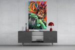 a mad scientist pouring a glowing green potion glass wall art displayed above a console in a designer interior