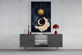 a gold sun and crescent moon on navy glass wall art displayed above a console in a designer interior