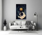 a gold sun and crescent moon on navy panel bringing character to a minimalist living room wall