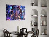 a blue-eyed woman among glowing flowers glass wall art leaning beside a dark leather sofa