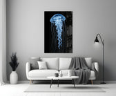 a blue jellyfish in black water panel bringing character to a minimalist living room wall