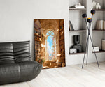 a sunlit library with floating pages glass wall art leaning beside a dark leather sofa