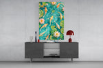 koi drifting through a turquoise lily pond glass wall art displayed above a console in a designer interior