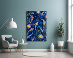 koi circling beneath glowing lotus at night glass wall art styled above an armchair in a reading corner
