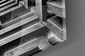 Close-up detail of the lit edges tracing each stacked beam on the glass surface