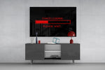 chaos loading red progress bar glass wall art displayed above a console in a designer interior