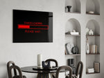 chaos loading red progress bar glass wall art leaning beside a dark leather sofa