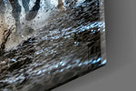 Close-up detail of the flying manes and the mud thrown up by the hooves on the glass surface