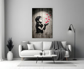 stencil girl releasing red paper cranes panel bringing character to a minimalist living room wall