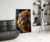 a roaring lion with a molten lava mane glass wall art leaning beside a dark leather sofa
