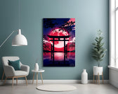 a torii gate before a crimson moon glass wall art styled above an armchair in a reading corner