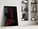 a cloaked figure at a red doorway panel resting in a shelving niche in a modern interior