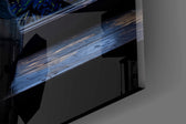 Close-up detail of the swirling cobalt brushwork and the cat's raised ears on the glass surface