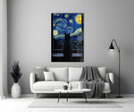 black cat at a starry night window panel bringing character to a minimalist living room wall