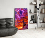 hooded reaper under a neon ring in the clouds glass wall art leaning beside a dark leather sofa