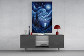 swirling starry night sky over water glass wall art styled in an atmospheric room setting